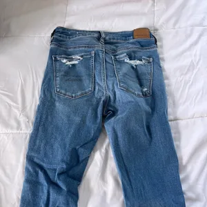 american eagle ripped skinny jeans thumbnail 2