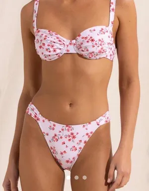 Chic floral bikini set perfect for summer. Features a beautiful pink floral pattern. thumbnail 1
