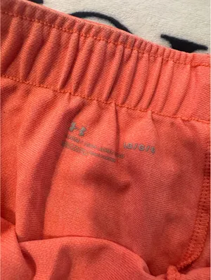 Under Armour Running Shorts Athletic Gym Workout in a coral orange tone Size L thumbnail 5