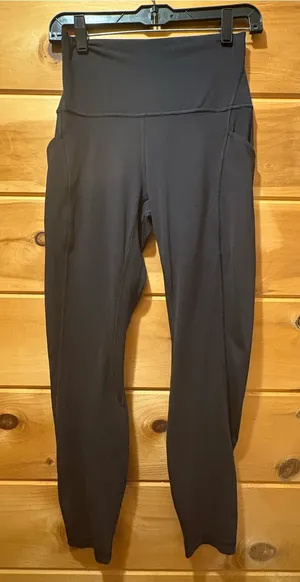 lululemon athletica Black High-Rise Leggings with Side Pockets size 6 thumbnail 1