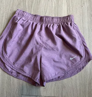 Nike Women's Lavender Athletic Shorts with White Swoosh thumbnail 1