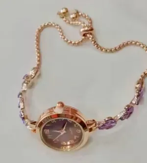 Brand New Purple and gold watch with purple gemstones thumbnail 3