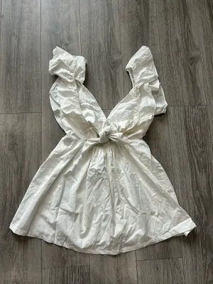 Showpo Raiza Mini Dress Ruffle Sleeve Tie Back Plunge Dress 100% Cotton In Off White! thumbnail 8