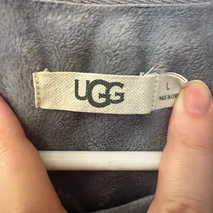 UGG Shanara Velvet Crew Neck Sweatshirt in the color Cloudy Grey. Large thumbnail 4
