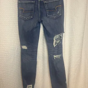 American Eagle Outfitters Ripped Blue Skinny Jeans thumbnail 4