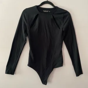Abercrombie & Fitch Black Cut-Out Long Sleeve Bodysuit Top Women's size Small thumbnail 1