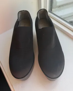 Donald J. Pliner Black Platform Slip-On Shoes thumbnail 1