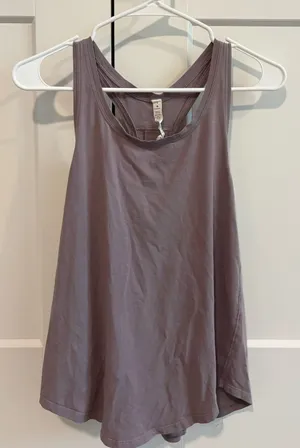Purple Lululemon Tank Top Size 4 small stain on back thumbnail 1