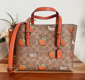 NWT COACH Mollie Tote‎ Bag 25 In Signature Canvas With Orange Print thumbnail 1
