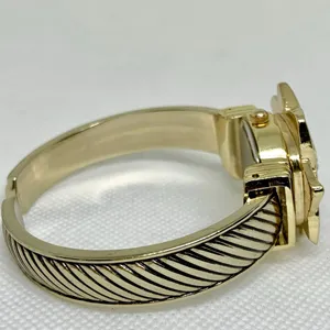 Vintage Gold Tone Enamel Poinsettia hidden face Cuff Style Watch 22mm running thumbnail 5
