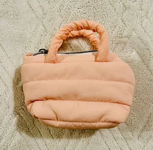 light pink puffy mini purse thumbnail 1