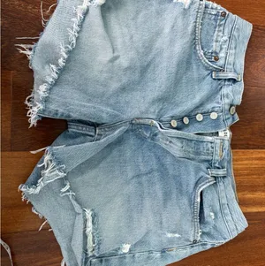 Agolde Faded Blue Frayed Jean Shorts thumbnail 1