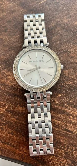 Michael Kors silver color faux diamond watch fits a small wrist 5 inches laying thumbnail 1