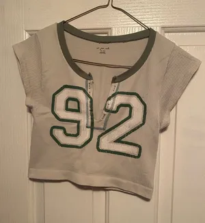 Urban Outfitters White Cropped Tee with Green '92' Graphic thumbnail 1
