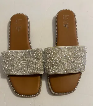 Nicole Miller Pearl-Embellished Cream Slide Sandals thumbnail 1