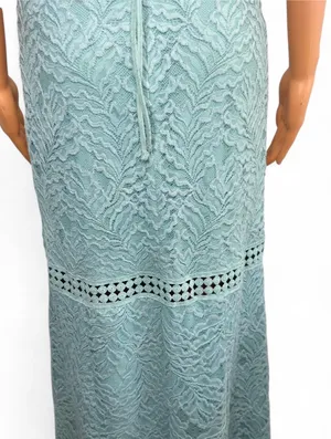 GUESS Sleeveless Mint Lace Halter Maxi Dress. Elegant mint lace halter maxi dress with delicate crochet trim. Soft mint color adds a fresh, feminine look. Halter neckline flatters the shoulders for a polished silhouette. Lightweight lace fabric offers breathable, comfortable wear. Ideal for weddings, garden parties, or special occasions. thumbnail 6