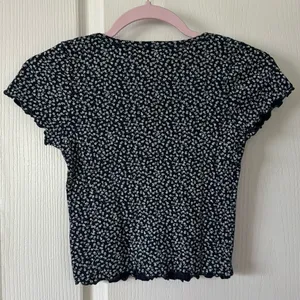 Brandy Melville Navy Floral Zelly Top thumbnail 3