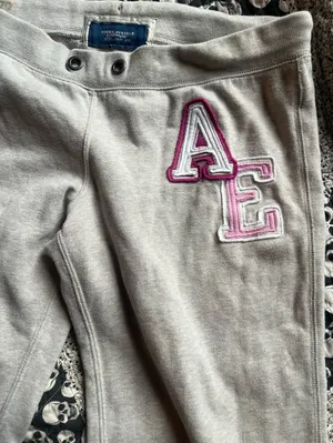 American Eagle Outfitters Light Gray Track Pants with Pink AE Patch thumbnail 2