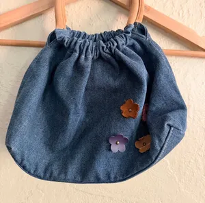 Denim Mini Bag with Floral Appliqués and Tan Handles thumbnail 1