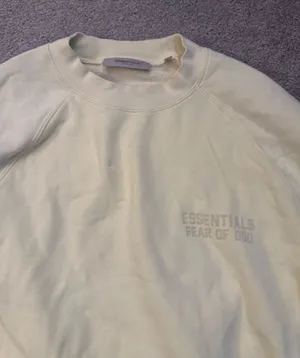 light yellow fear of god essentials sweatshirt thumbnail 1