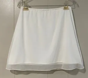 Brandy Melville White Mini Skirt Women’s Size 2 (Fits XS/S) thumbnail 1