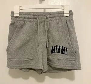 Faded Rose Essentials gray shorts size small; w/ MIAMI embroidered thumbnail 1