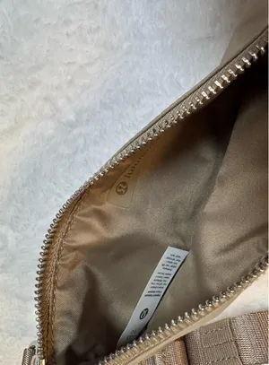 Dual pouch sling bag in beige by Lululemon thumbnail 9