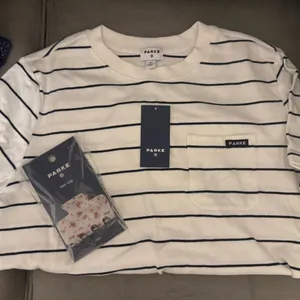 New Parke x Target navy and white striped tee and floral hair clip thumbnail 1