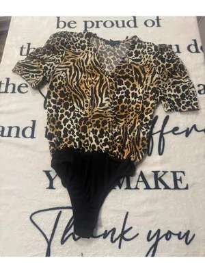 Modern animal-print bodysuit with a wrap neckline by "a... love story," size S thumbnail 2