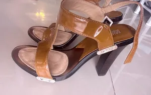 Stylish Brown High Heel Sandals pair of brown Michael Kors platform sandals. 5.5 thumbnail 1