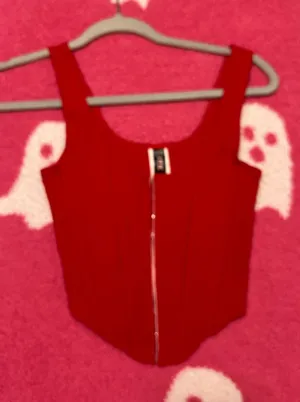 Mystique Boutique Stylish red sleeveless top with a front zipper. Perfect for casual outings. thumbnail 1