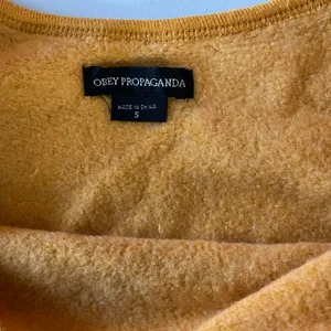 Mustard yellow women’s OBEY pullover sweatshirt small Y2k cute thumbnail 5