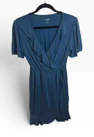 Alya Blue Jersey Knit Short Sleeve Ruffle Wrap Dress thumbnail 1