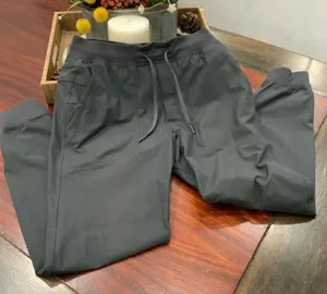 Comfortable black joggers by Lululemon Athletica. Ideal for active or casual wear. Lululemon Men’s Pants size M thumbnail 1