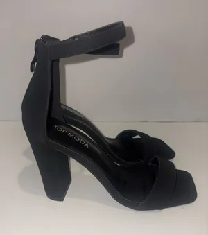 black Top Moda block heel strappy sandals feature an ankle strap with a zipper closure and an open square-toe design thumbnail 1