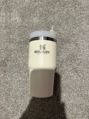 Stanley 20 oz adventure travel tumbler cream thumbnail 1