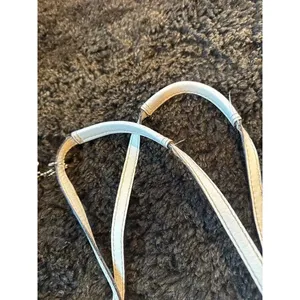 Signature coach bag with accent thumbnail 4