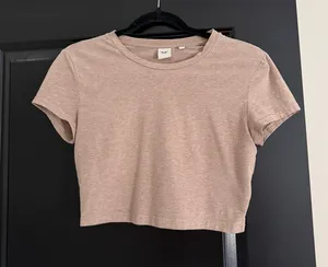 Aritzia TNA beige crop baby tee thumbnail 1