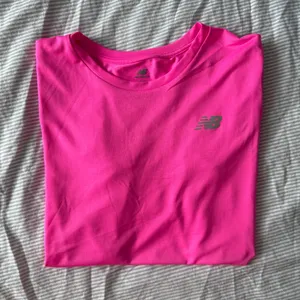 Women’s New Balance Neon Pink Activewear Shirt thumbnail 1