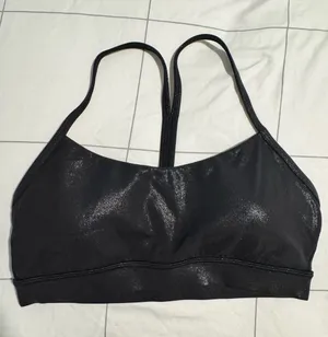 Black Shimmery lululemon flow-y sports bra size 6 thumbnail 1