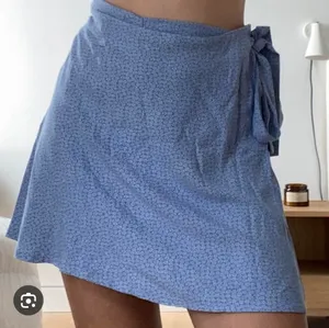 Brandy Melville Wrap Skirt Floral thumbnail 1