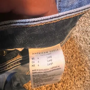 American Eagle Super High-Rise Jeggings‎ Size 4 Long Blue Wash Denim Jeans thumbnail 3