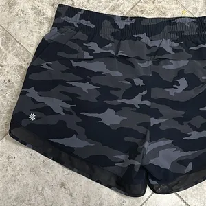 Athleta Racer Run Mid Rise Short 4” Black Camo Size Large thumbnail 11