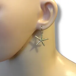 Gold tone textured starfish dangle earrings thumbnail 1