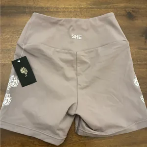Darc Sport Quad Wolf Beau Shorts Women’s Small Purple Stone Biker Shorts New NWT thumbnail 4