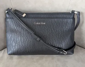 Calvin Klein grain leather crossbody bag thumbnail 1