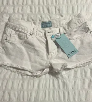 Revise optical white editors, cut jean short size 25 thumbnail 1