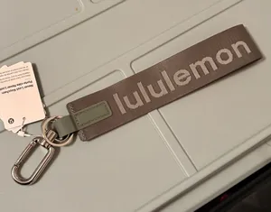 Lululemon Never Lost Keychain Spellout Logo Willow Leaf/Meadow Haze Silver thumbnail 1
