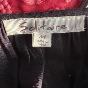 Solitaire brand black Tunic with embroidery and flows arms. Size M thumbnail 4