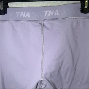 Aritzia TNA Purple Logo Mid Rise 7/8 Leggings Women’s Size Small thumbnail 10
